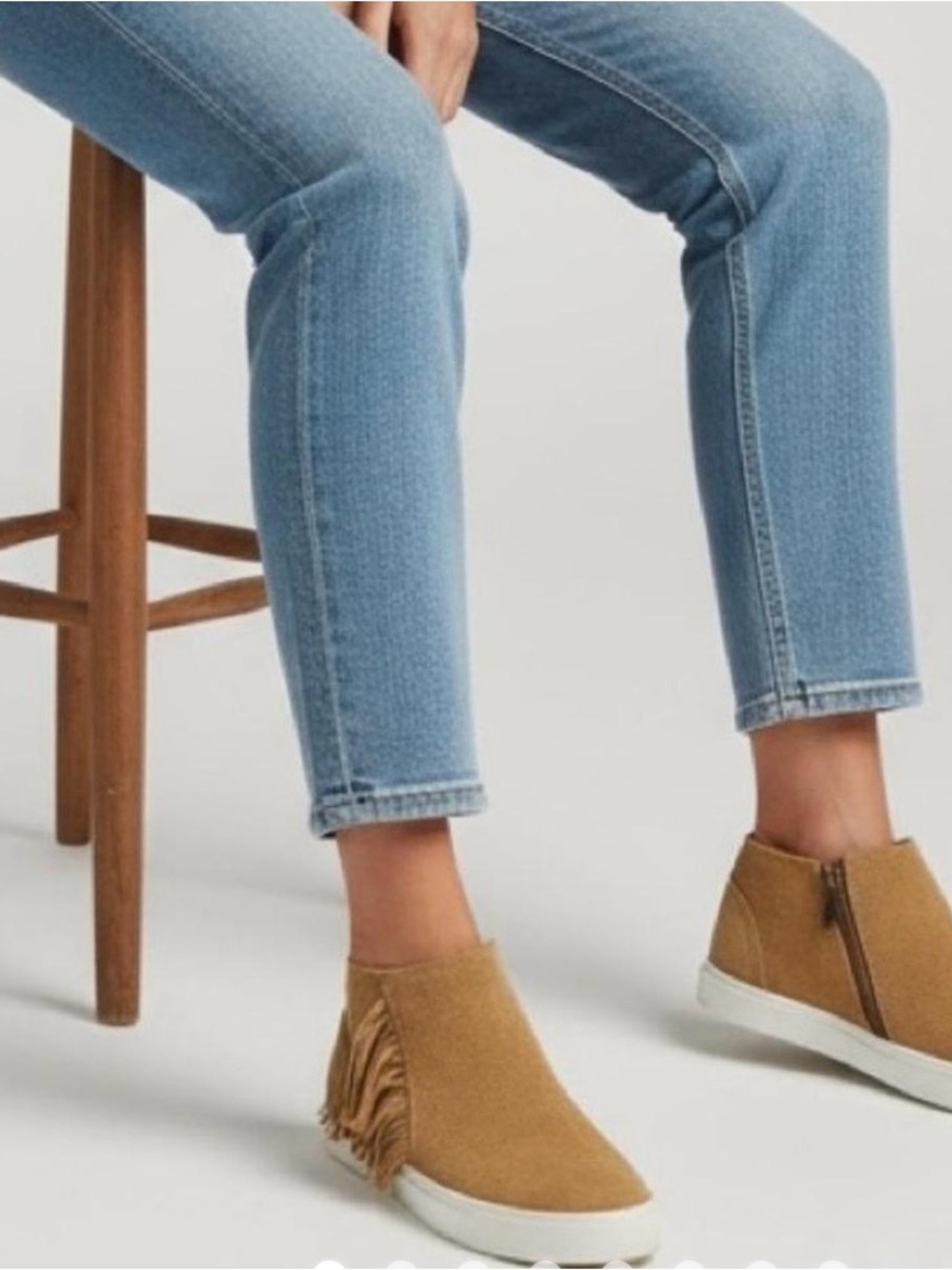 Minnetonka Fringe Slip-On Sneaker Booties in taupe